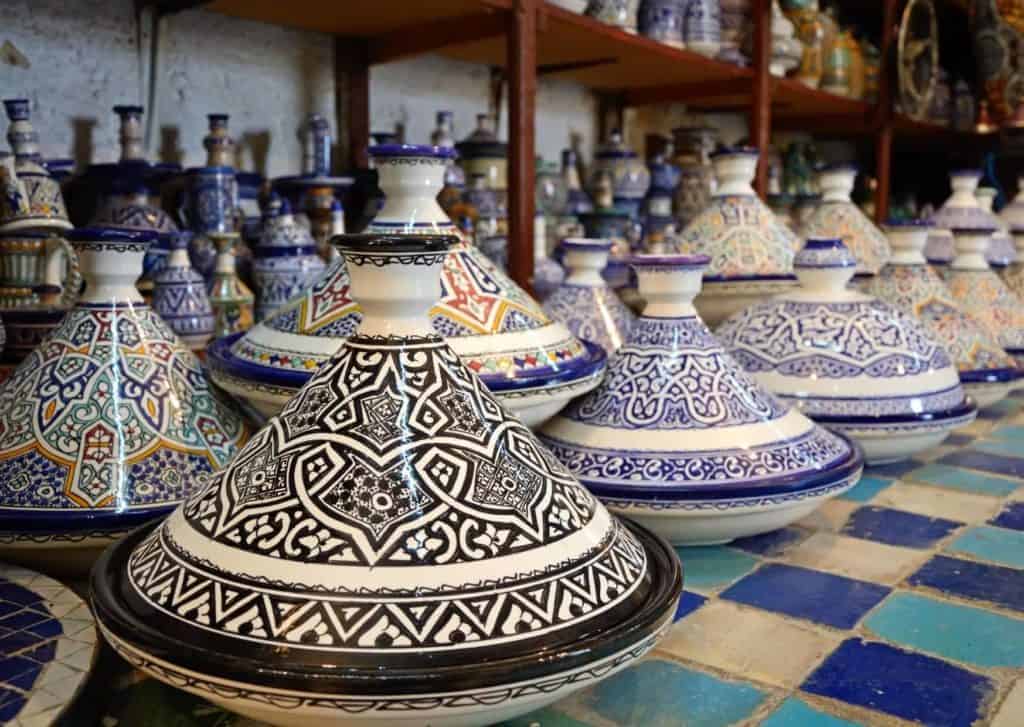 table filled with tagine clay pots 