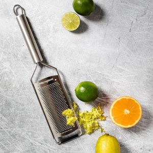 grater or zester with citrus