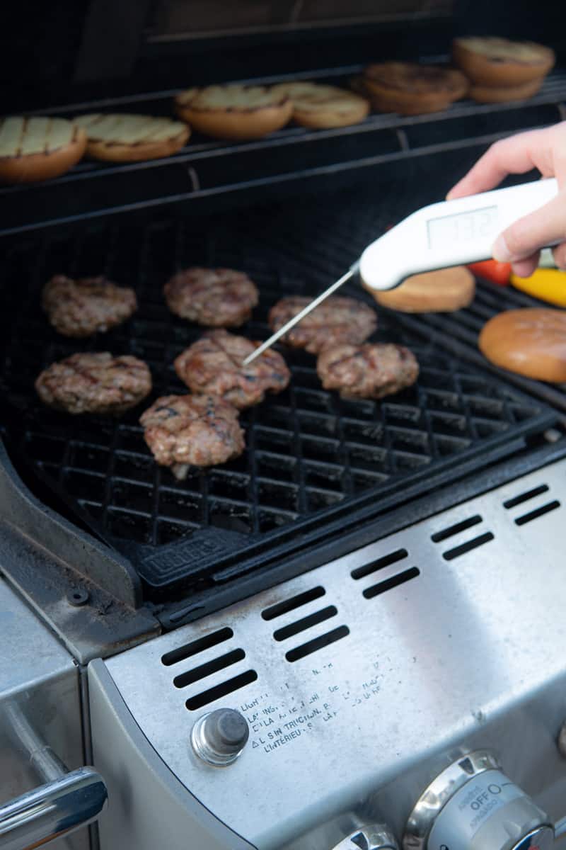 lamb burgers on grill
with thermometer
