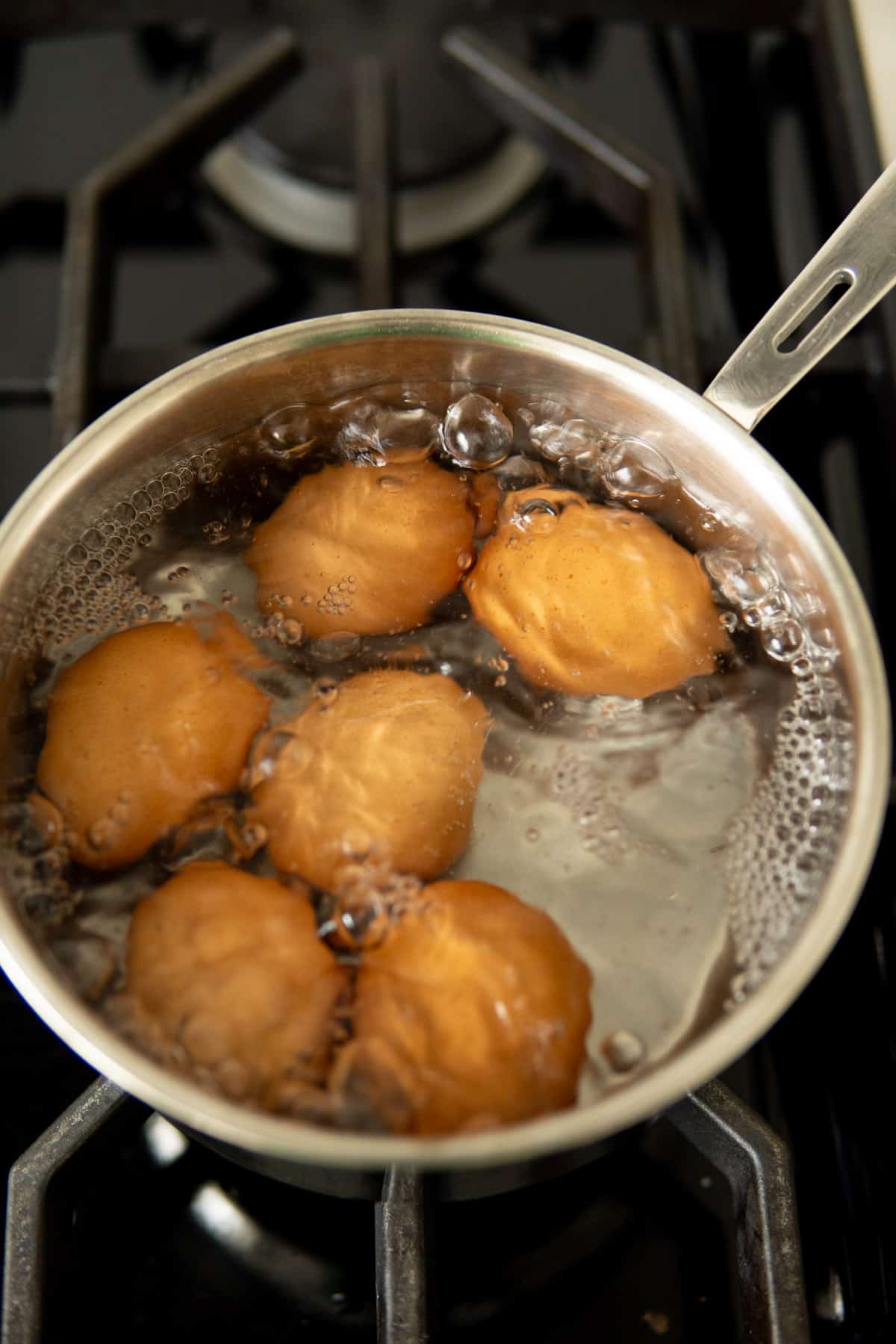 Eggs in a pot with boiling water.