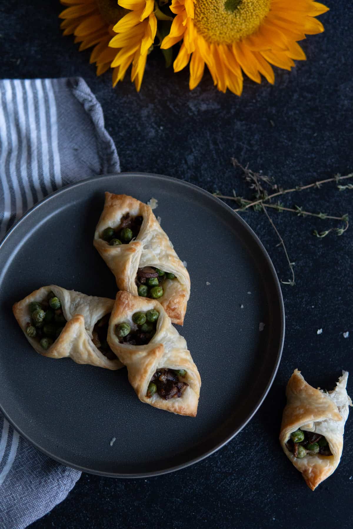 Baked puff pastries on mushroom on a plate.