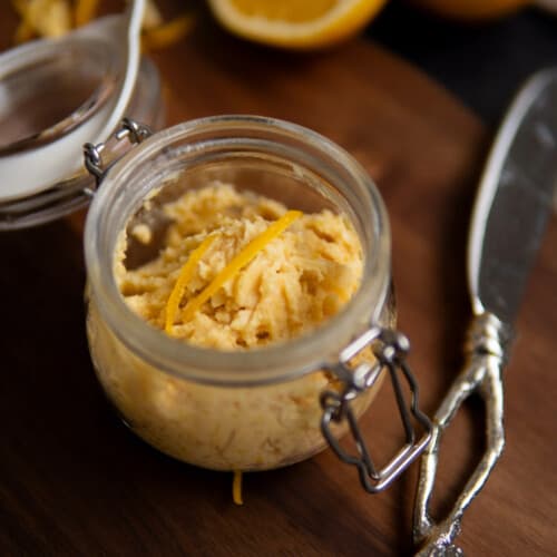 miso butter in glass jar with orange zest and butter knife