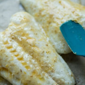 fish fillet with miso butter melted and spread with spatula