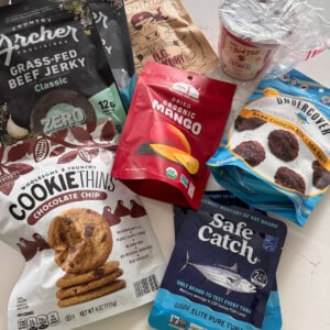 packaged airplane snacks on kitchen counter.