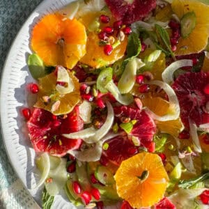 platter with citrus rounds, fennel and pomegranate