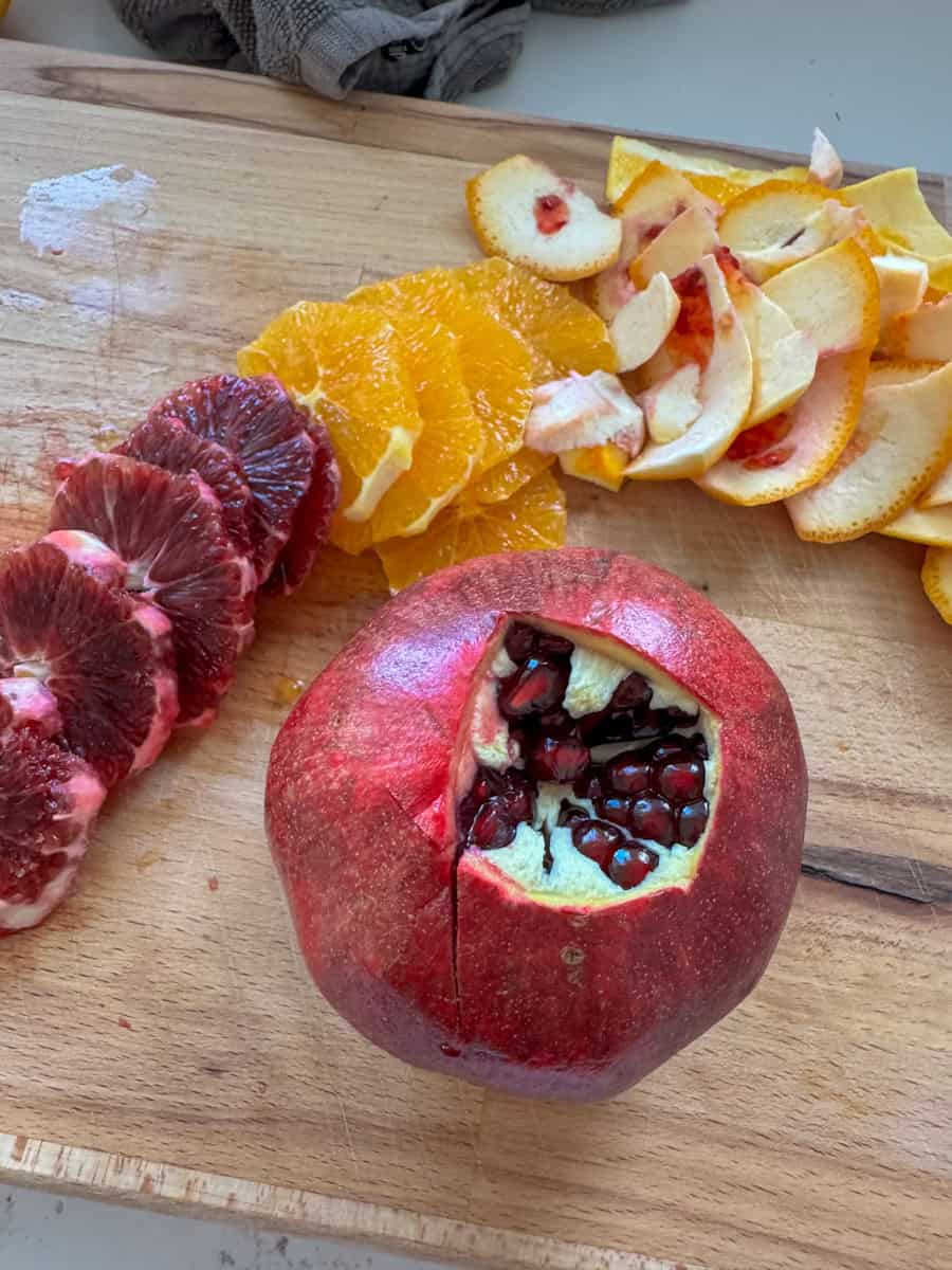 oranges and whole pomegranate 