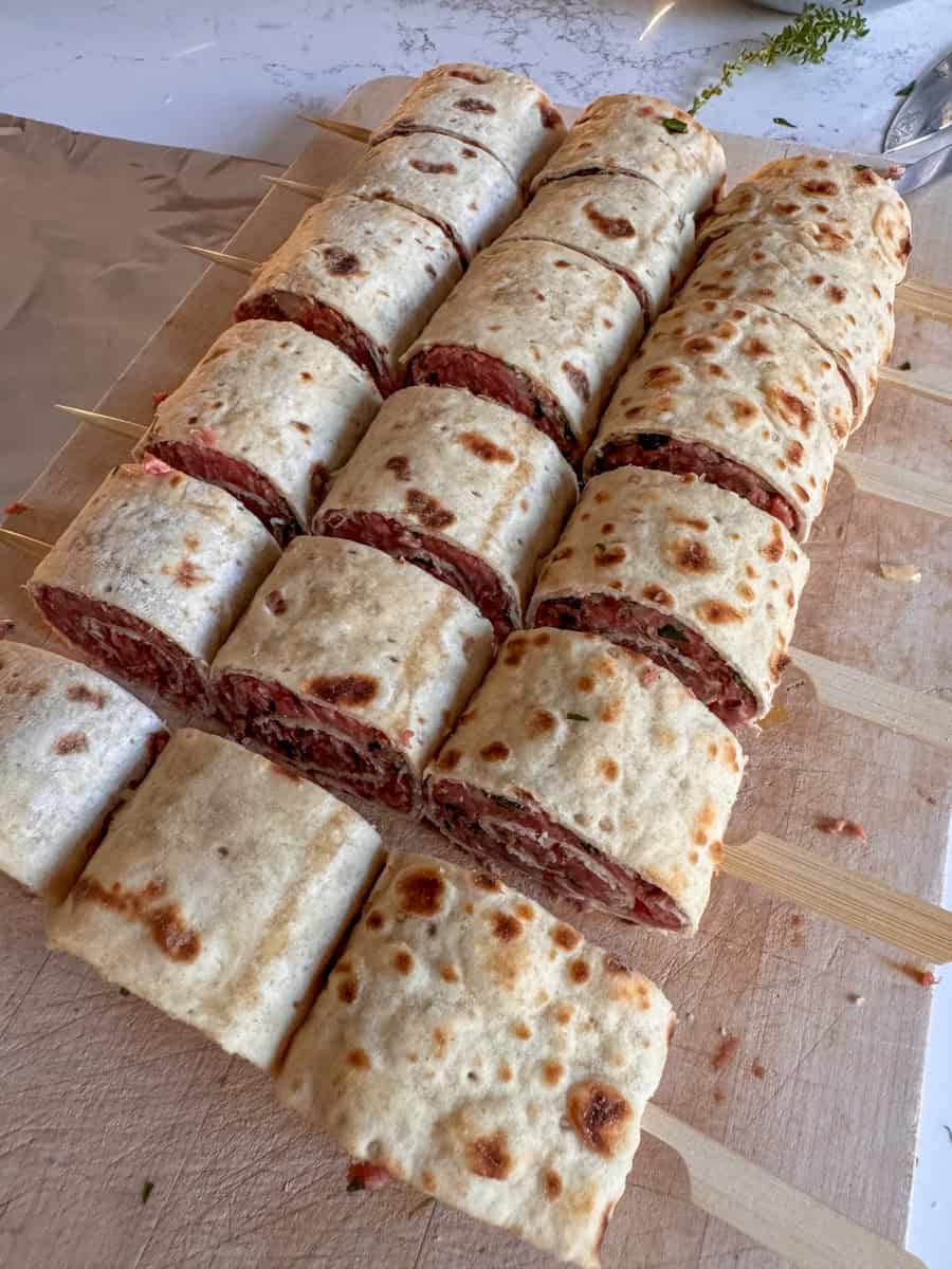 skewers of rolled lavash bread stuffed with ground beef. 