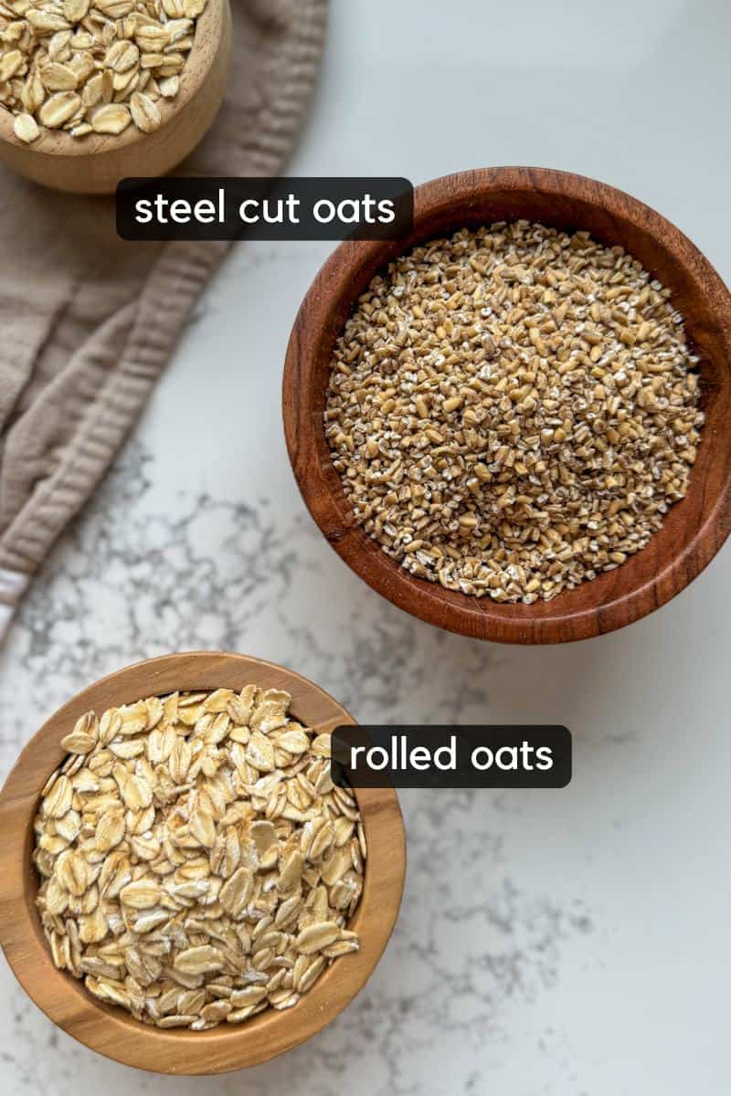 different types of uncooked oatmeal in small bowls